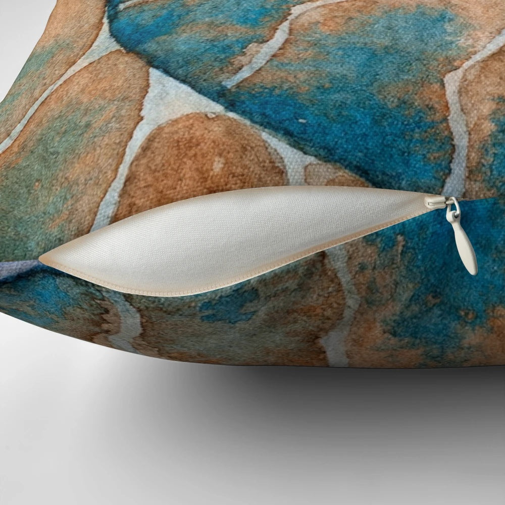 Vibrant watercolor painting of an ammonite fossil with a captivating spiral pattern in shades of blue and gold.