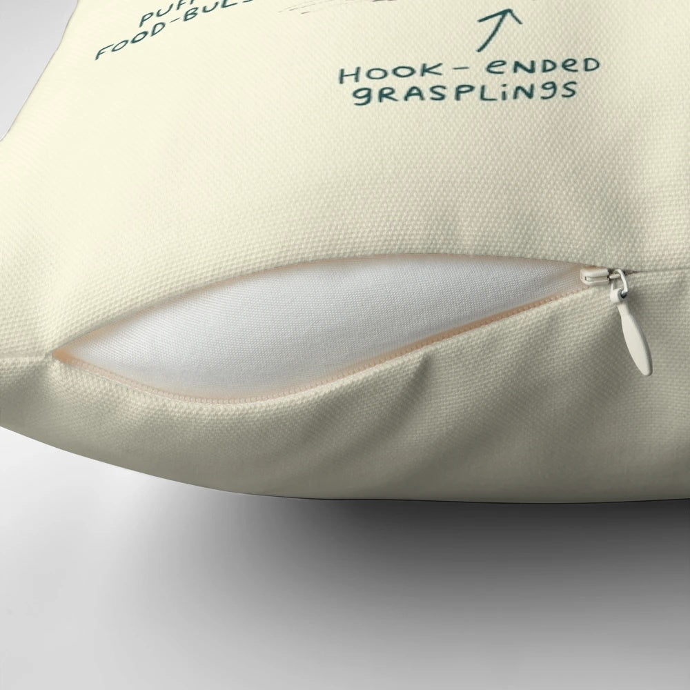 Closeup of a cockatiel-shaped pillow with detailed feather pattern and beak