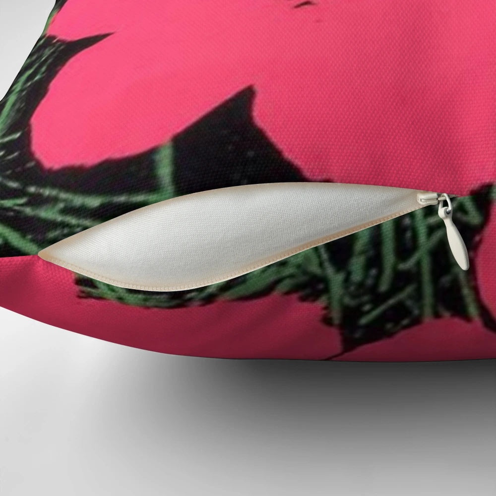 Colorful floral pillow with pink and yellow flowers in the style of Andy Warhol's pop art paintings