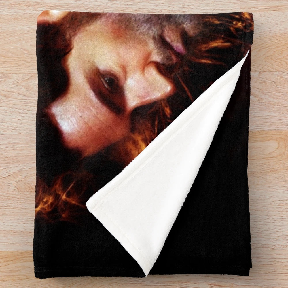 Plush blanket with fiery wings design, inspired by the Lucifer TV show
