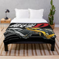 Plush blanket with anime cars drifting on a mountain road