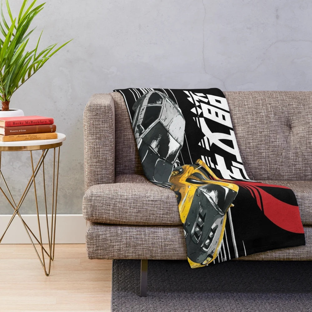 Plush blanket with anime cars drifting on a mountain road