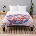 Cardcaptor Sakura inspired plush blanket featuring a floral sealing wand design