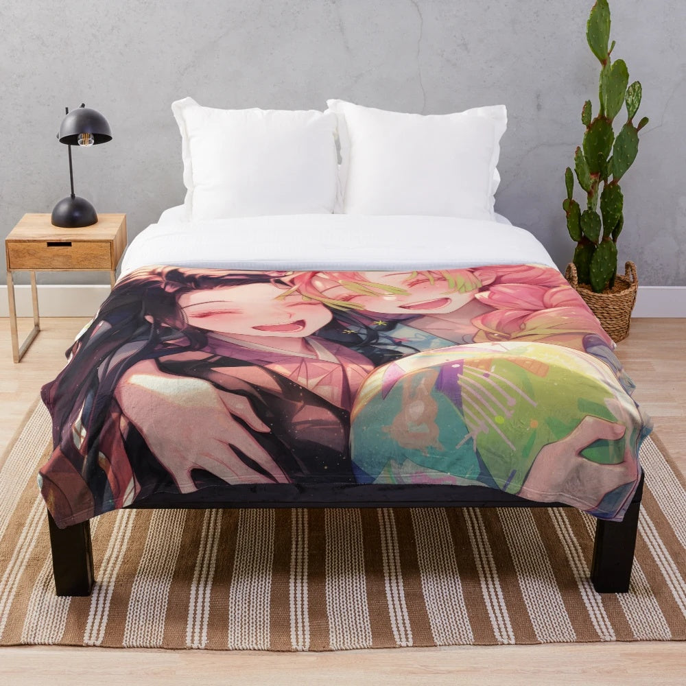 Colorful anime-style plush blanket featuring Nezuko Kamado and Mitsuri Kanroji from the popular Demon Slayer series