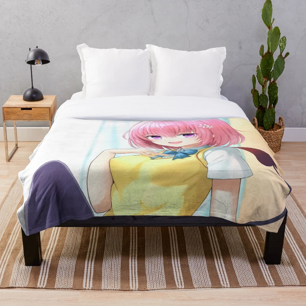 Momo Belia Deviluke anime girl character on a plush blanket