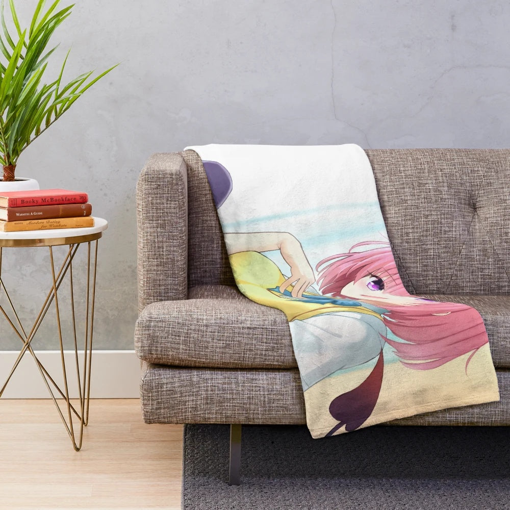 Momo Belia Deviluke anime girl character on a plush blanket