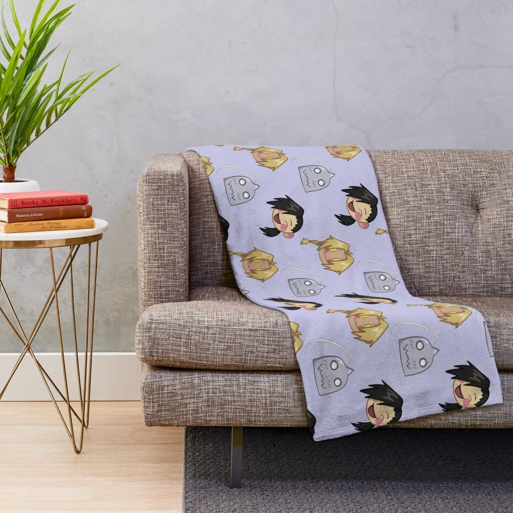 Anime-inspired plush blanket with tile print featuring Edward Elric, Ling Yao, and Alphonse Elric from Fullmetal Alchemist