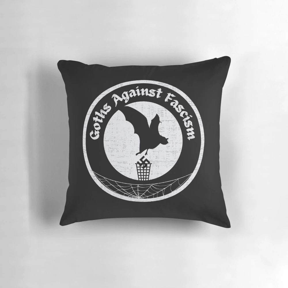 Anti-fascist gothic-themed decorative pillow with bat and spider web design