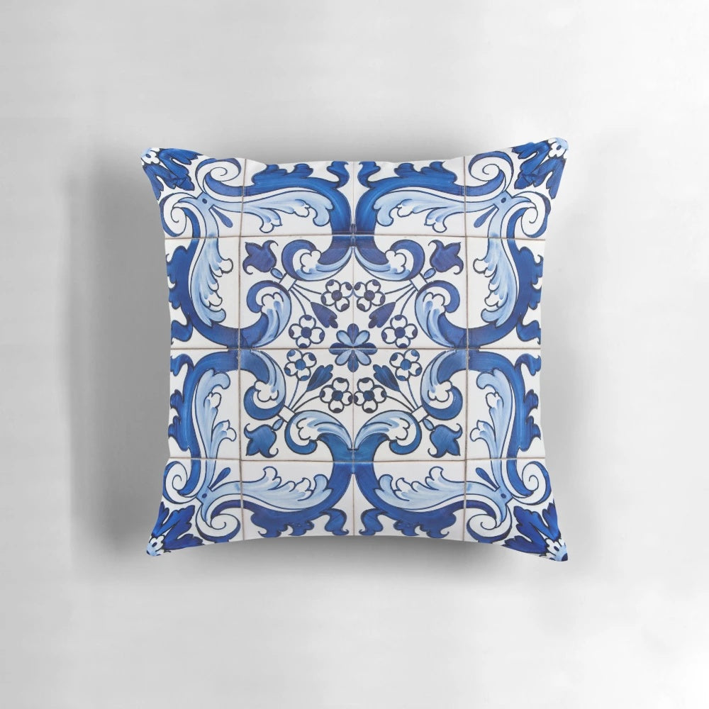 Antique azulejo tile pillow with a traditional Portuguese floral ceramic tile pattern