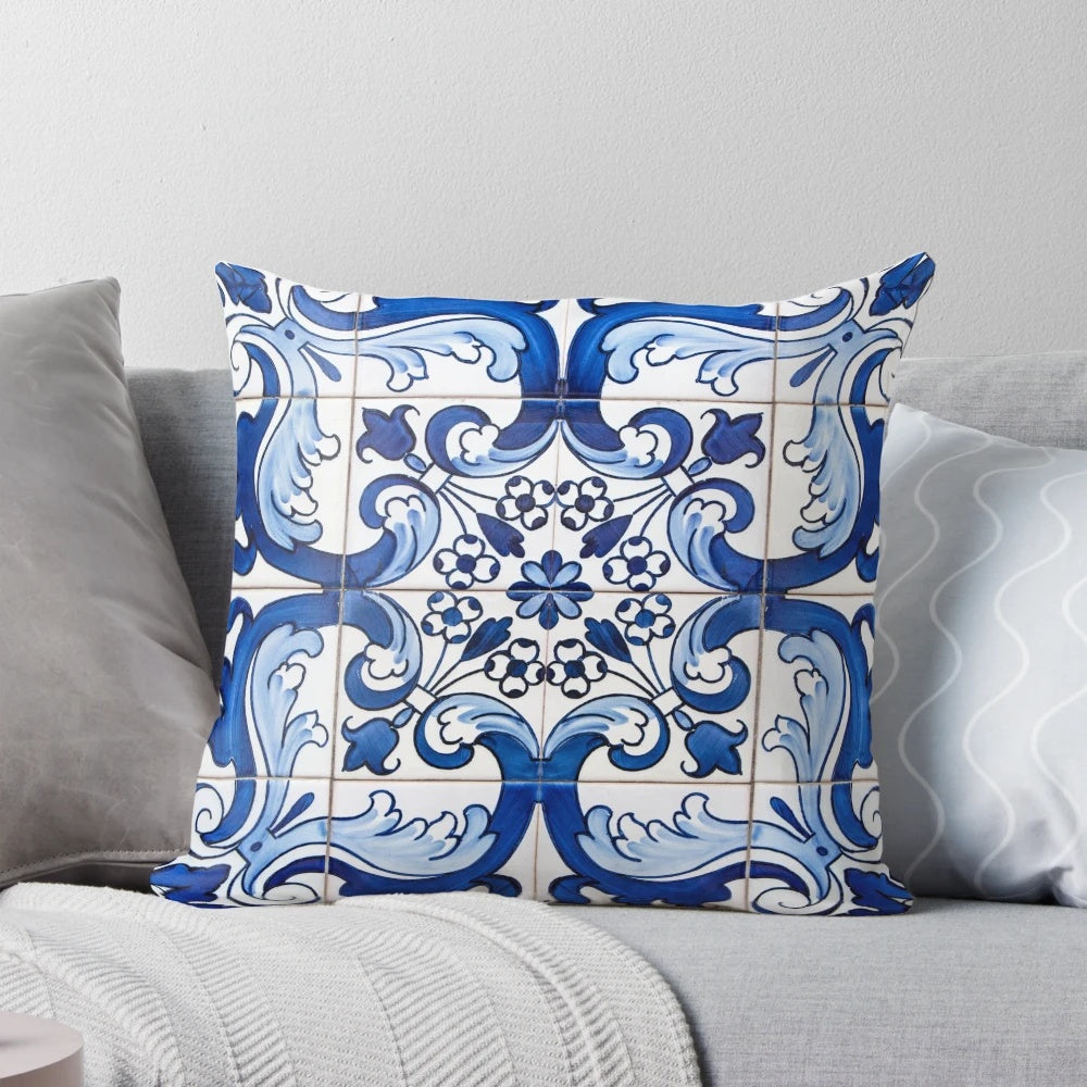 Antique azulejo tile pillow with a traditional Portuguese floral ceramic tile pattern