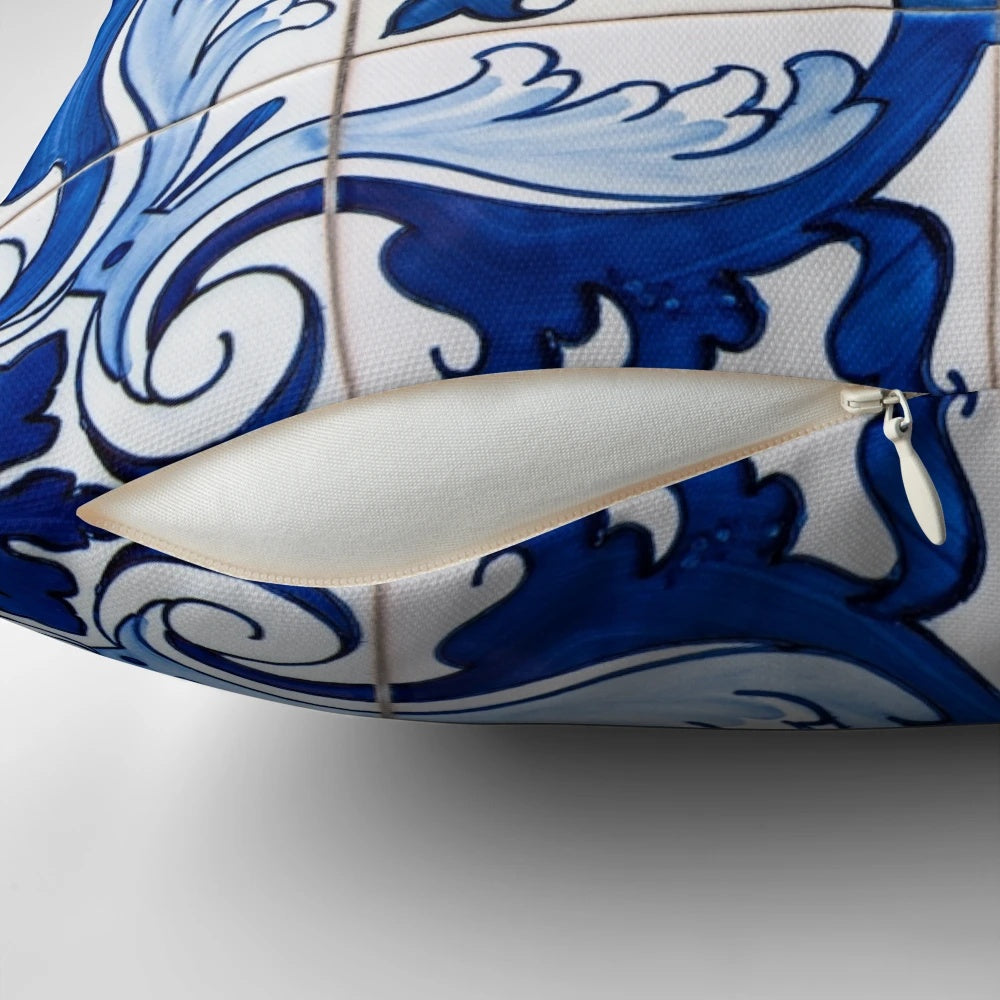 Antique azulejo tile pillow with a traditional Portuguese floral ceramic tile pattern