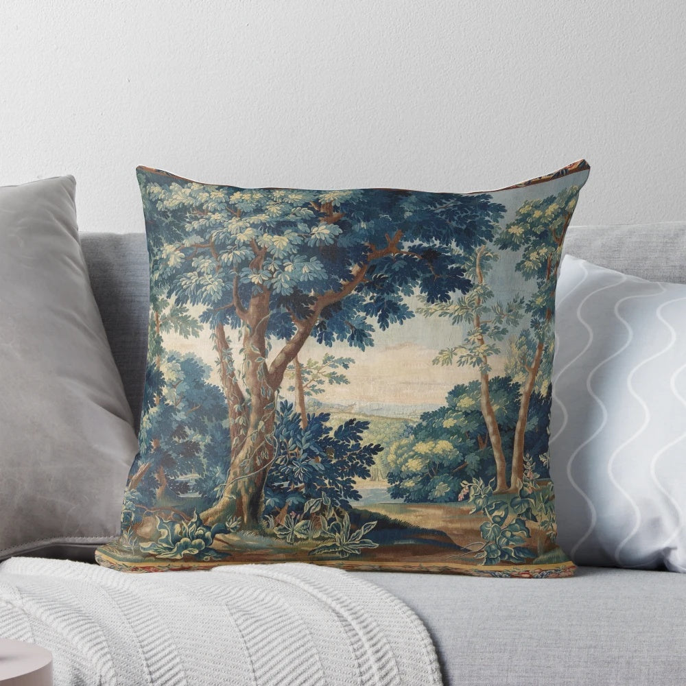 Antique tapestry-inspired pillow with a lush, green woodland landscape design
