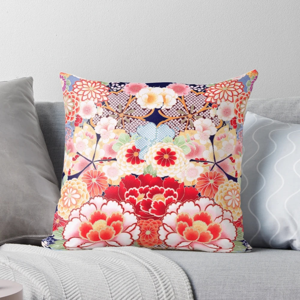 Antique-style floral pillow featuring a vibrant design of Japanese-inspired pink, white, and blue wild roses and peonies.