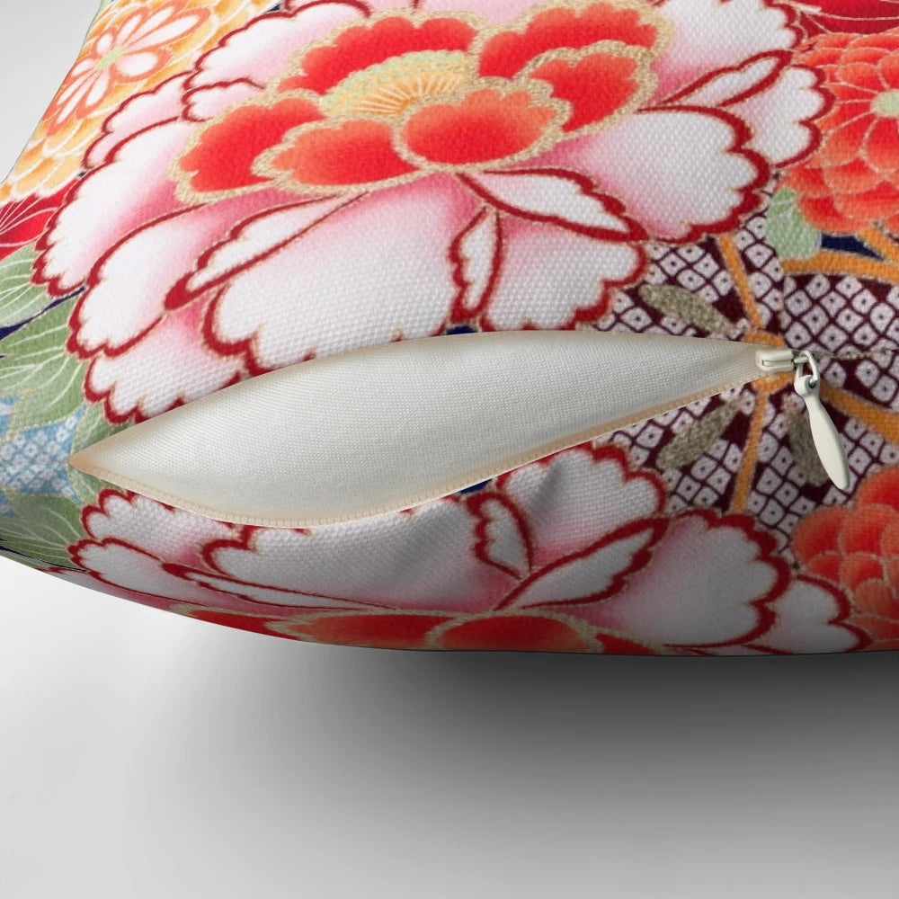 Antique-style floral pillow featuring a vibrant design of Japanese-inspired pink, white, and blue wild roses and peonies.