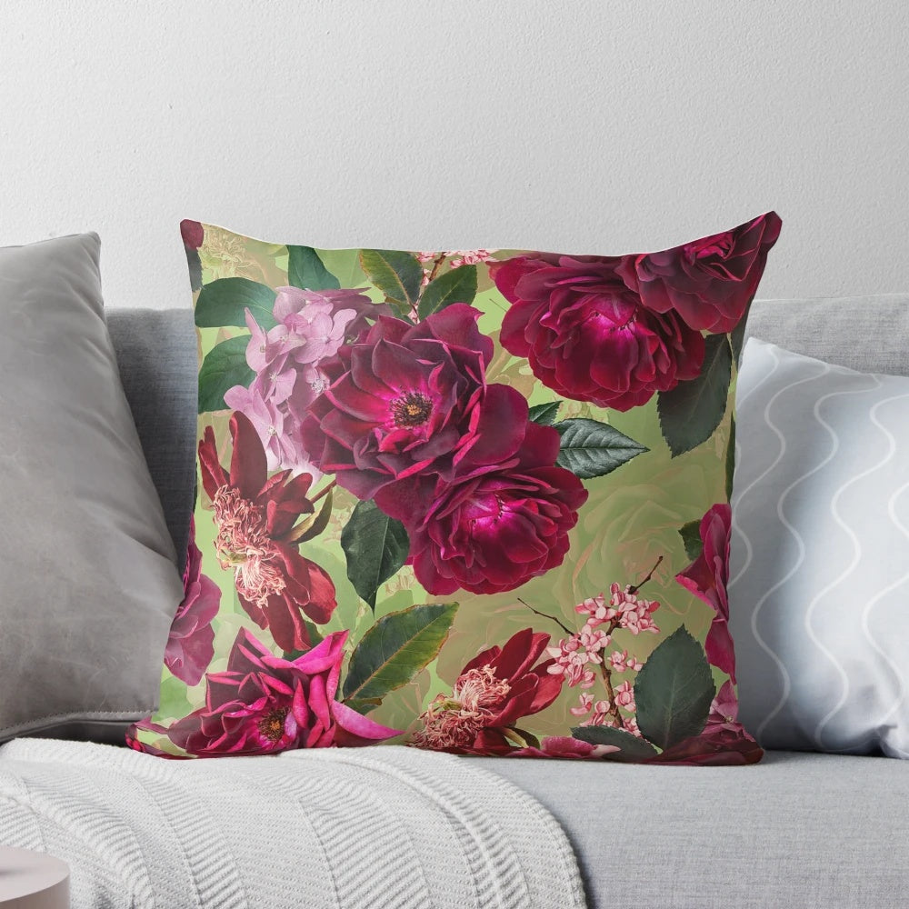 Antique green botanical flower rose pillow with a vintage, mystical pattern for botanical-inspired home decor.