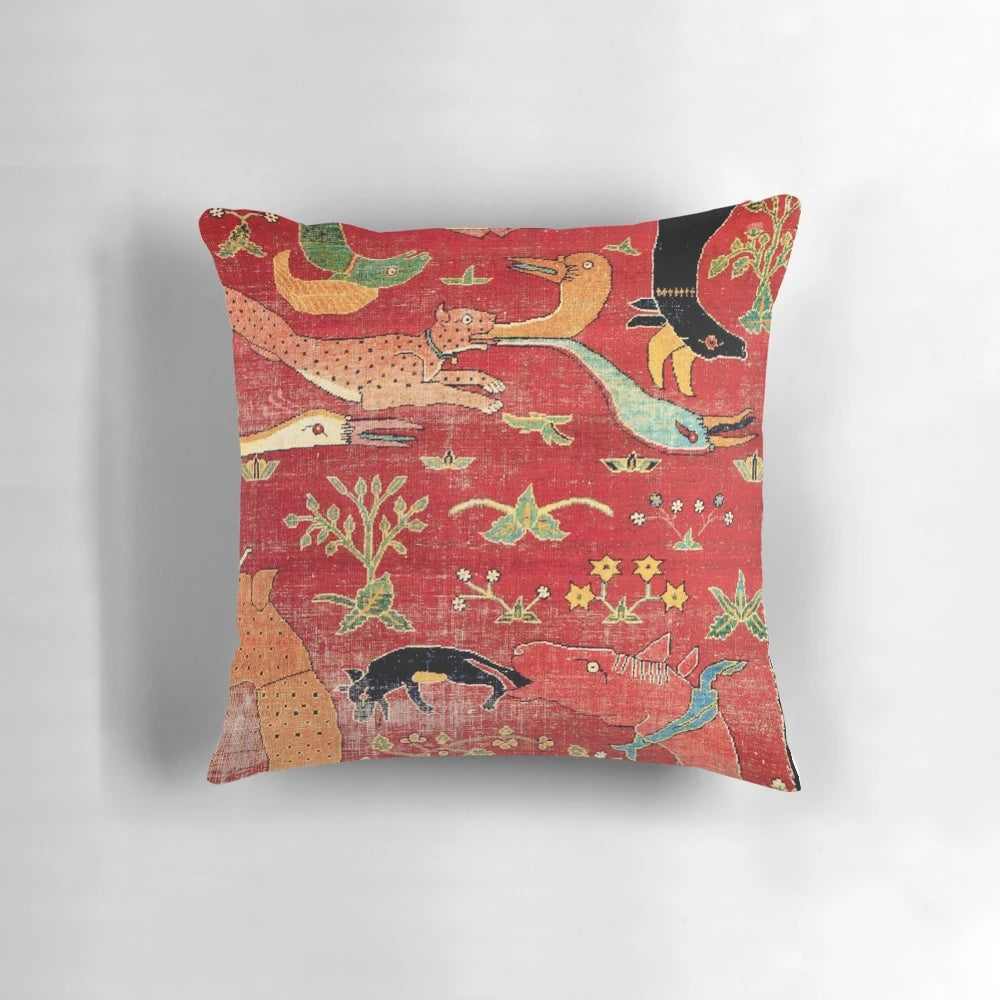 Antique-inspired decorative pillow with a Mughal-style floral and tribal pattern