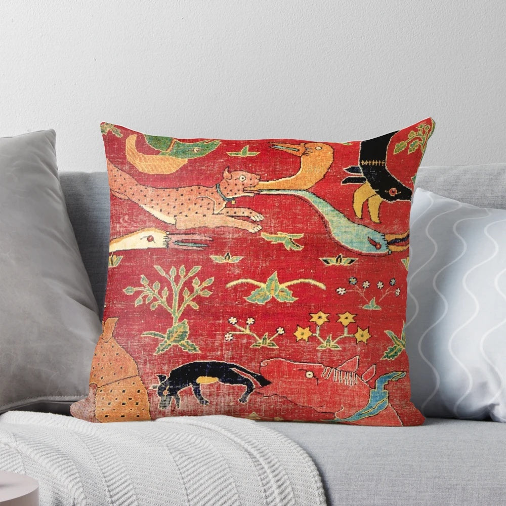 Antique-inspired decorative pillow with a Mughal-style floral and tribal pattern