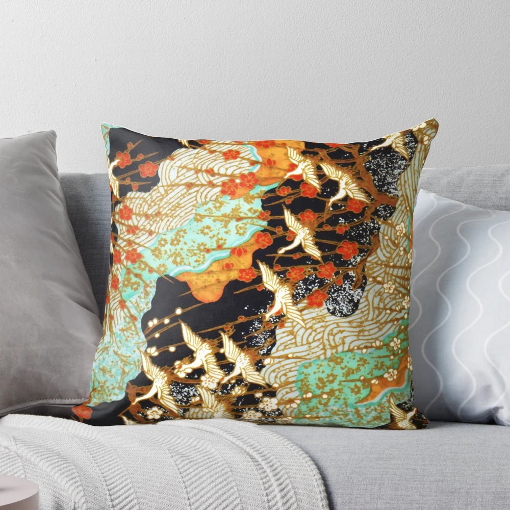 Antique Japanese-inspired floral pillow featuring graceful flying cranes and vibrant spring flowers against a teal blue sky