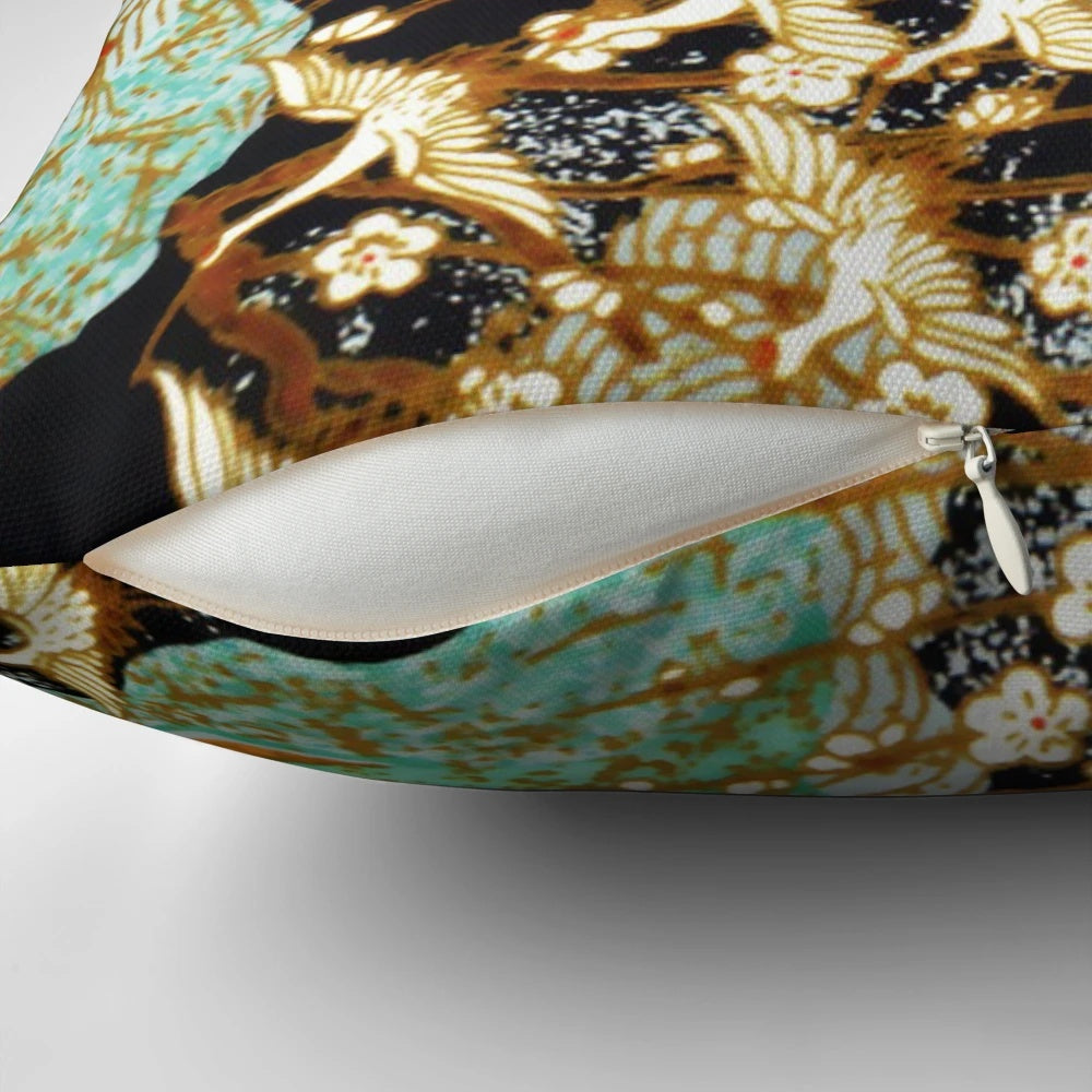 Antique Japanese-inspired floral pillow featuring graceful flying cranes and vibrant spring flowers against a teal blue sky