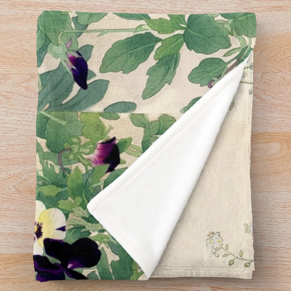 Antique Japanese floral plush blanket featuring vibrant pansies and lush green leaves