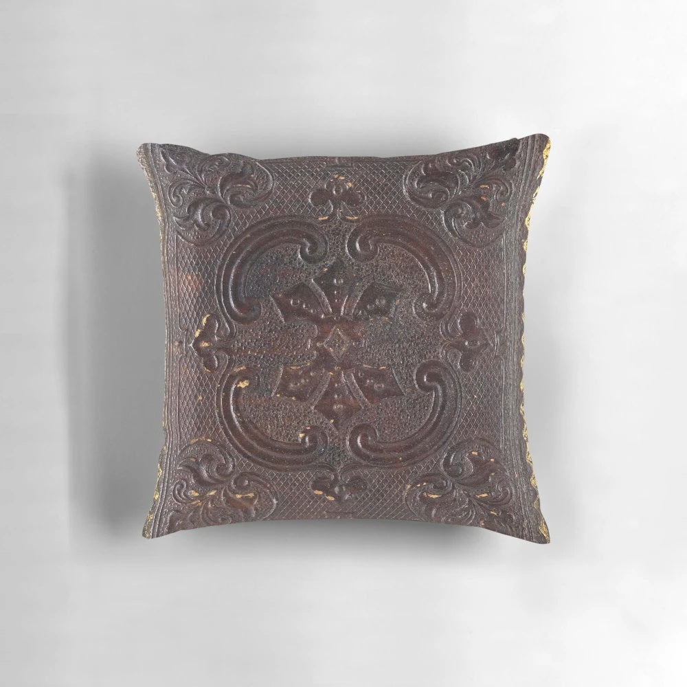 Vintage leather book pillow with antique, gothic, and steampunk design