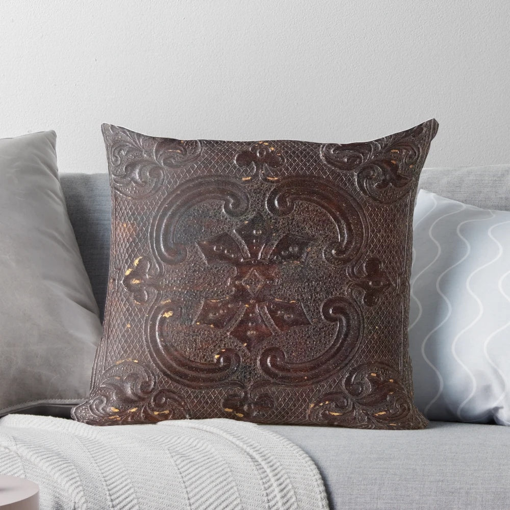 Vintage leather book pillow with antique, gothic, and steampunk design