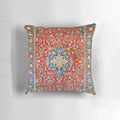 Decorative pillow with an antique Persian rug-inspired floral print design