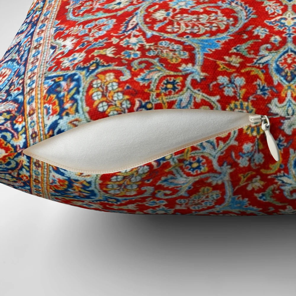 Decorative pillow with an antique Persian rug-inspired floral print design