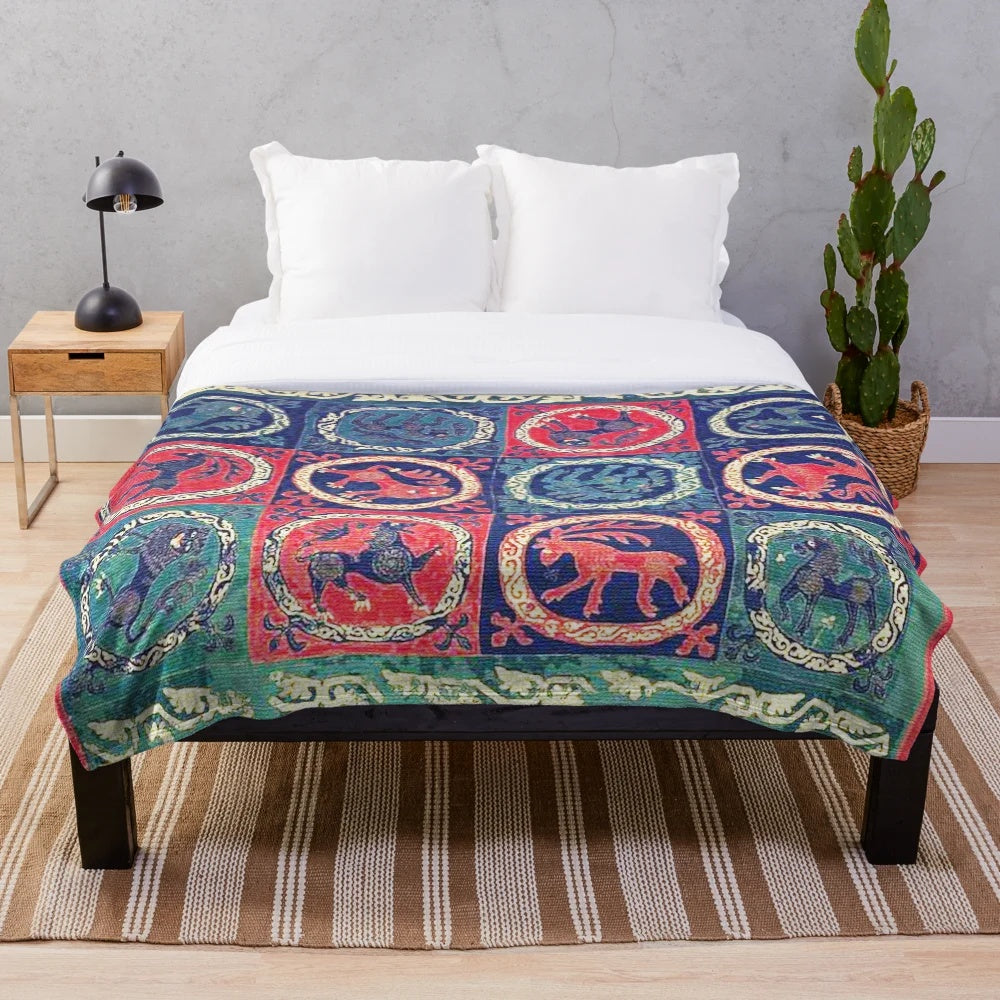 Plush blanket with medieval bestiary design including deer, unicorns, and lions on an antique Scandinavian tapestry-style pattern