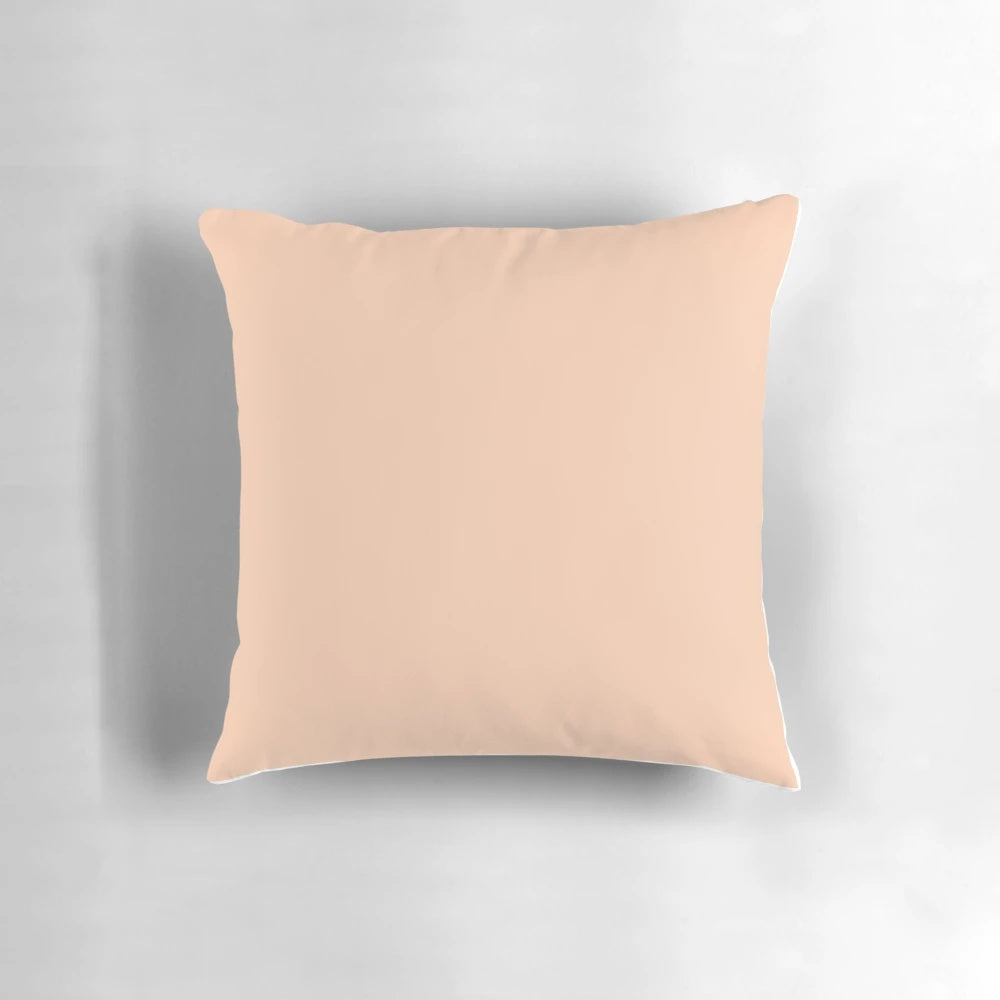 Apricot solid color pillow, a soft and cozy home decor item inspired by the vibrant hue of apricots.