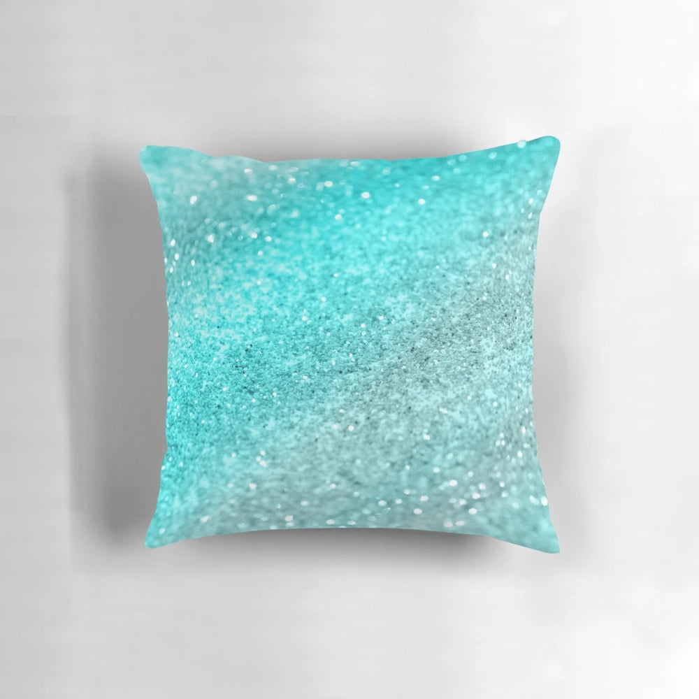 Aqua teal ocean glam pillow with shimmering glitter accents, creating a magical and tropical vibe.