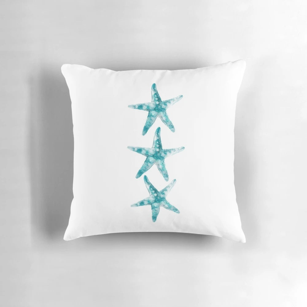 Aquamarine starfish pillow with a nautical, seaside pattern