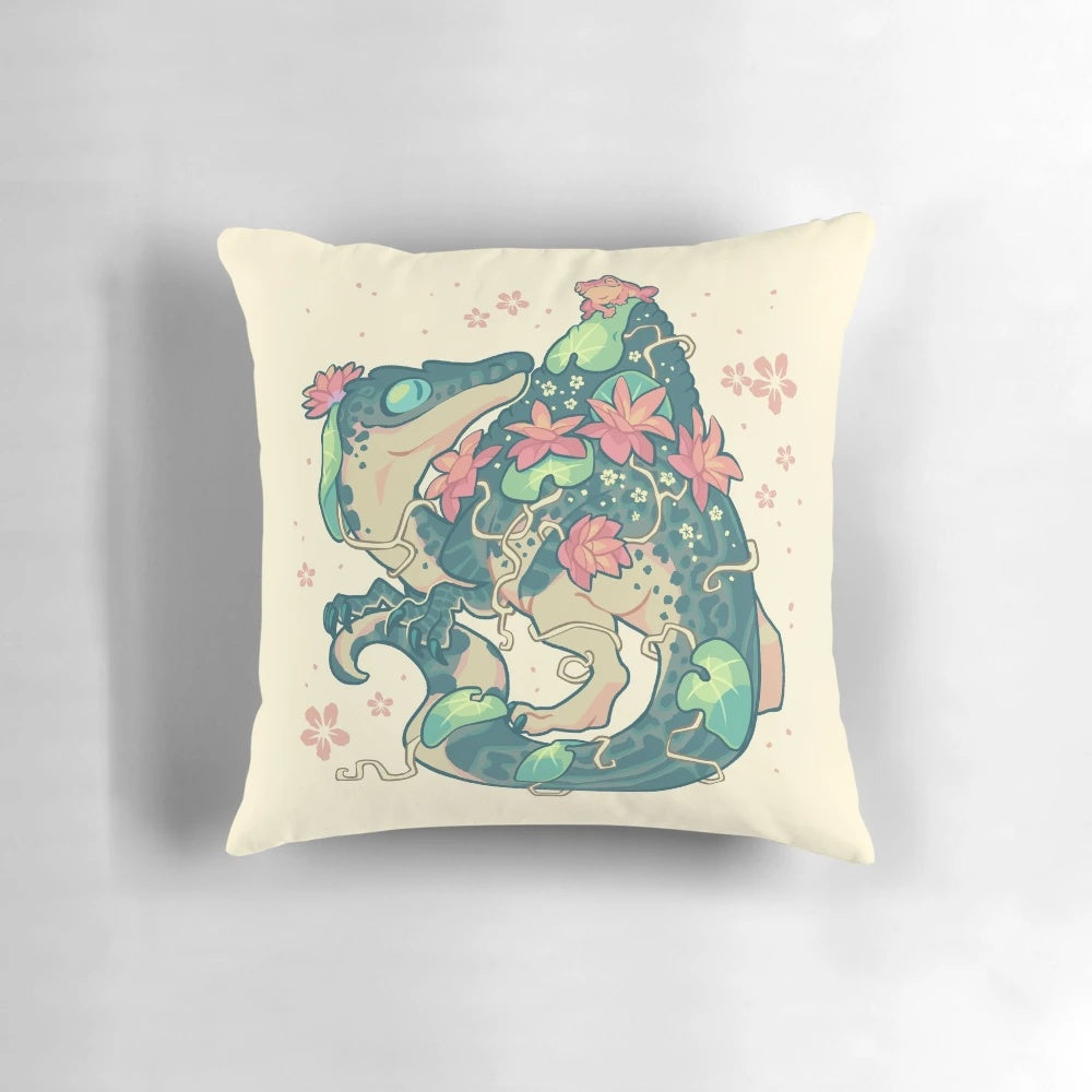 Soft, plush pillow featuring a whimsical design of a spinosaurus dinosaur and a frog in a natural, aquatic setting.
