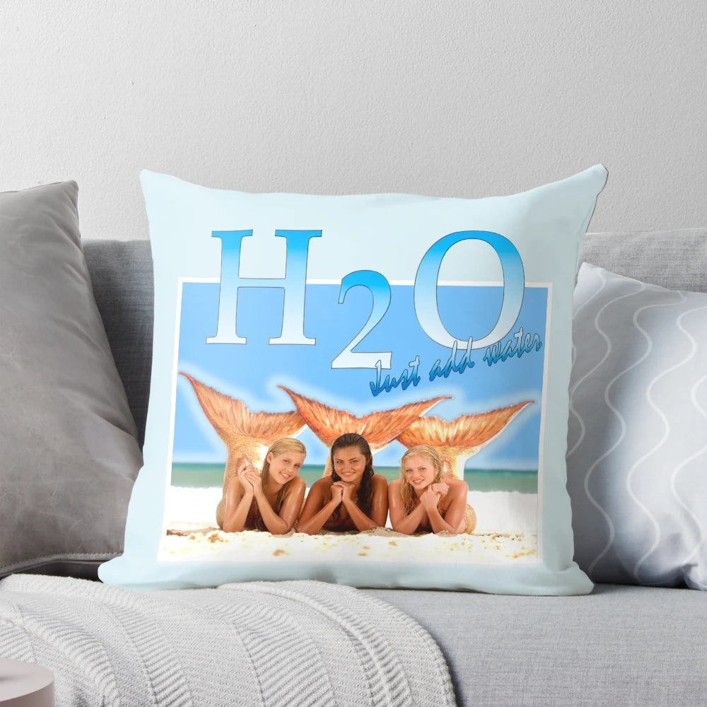H2O-themed pillow with a mermaid/siren design