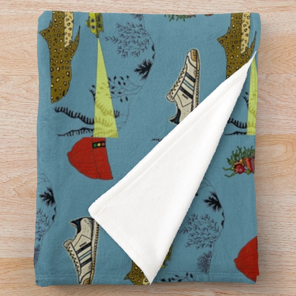 Plush blanket featuring the underwater pattern from the Wes Anderson film The Life Aquatic with Steve Zissou