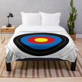 Plush blanket featuring an archery target design