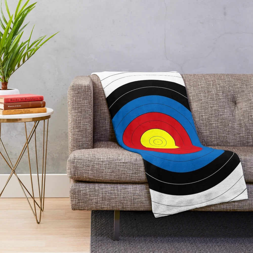 Plush blanket featuring an archery target design