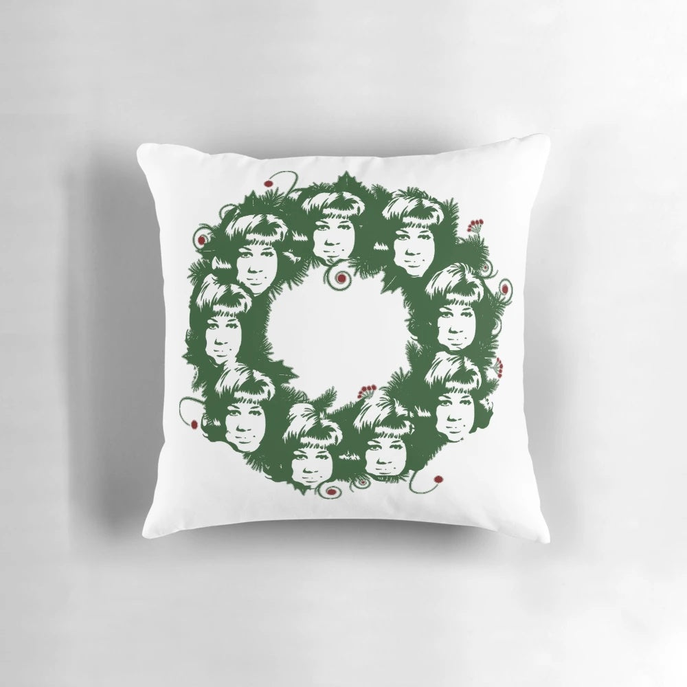 Aretha Franklin-themed Christmas wreath with green leaves and holiday ornaments
