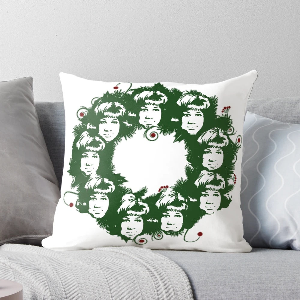 Aretha Franklin-themed Christmas wreath with green leaves and holiday ornaments