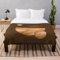 Dune-inspired plush blanket with Arrakis planet design