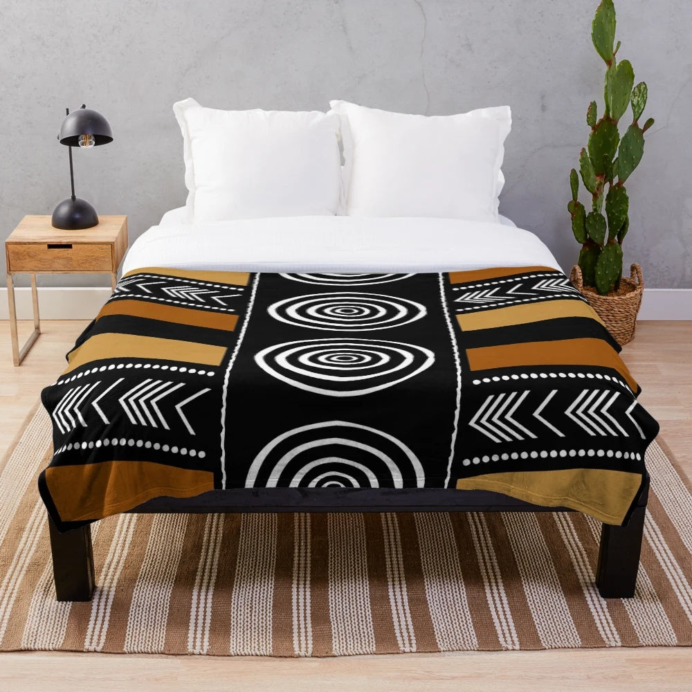 African mud cloth inspired plush blanket with abstract tribal patterns
