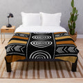 African mud cloth inspired plush blanket with abstract tribal patterns