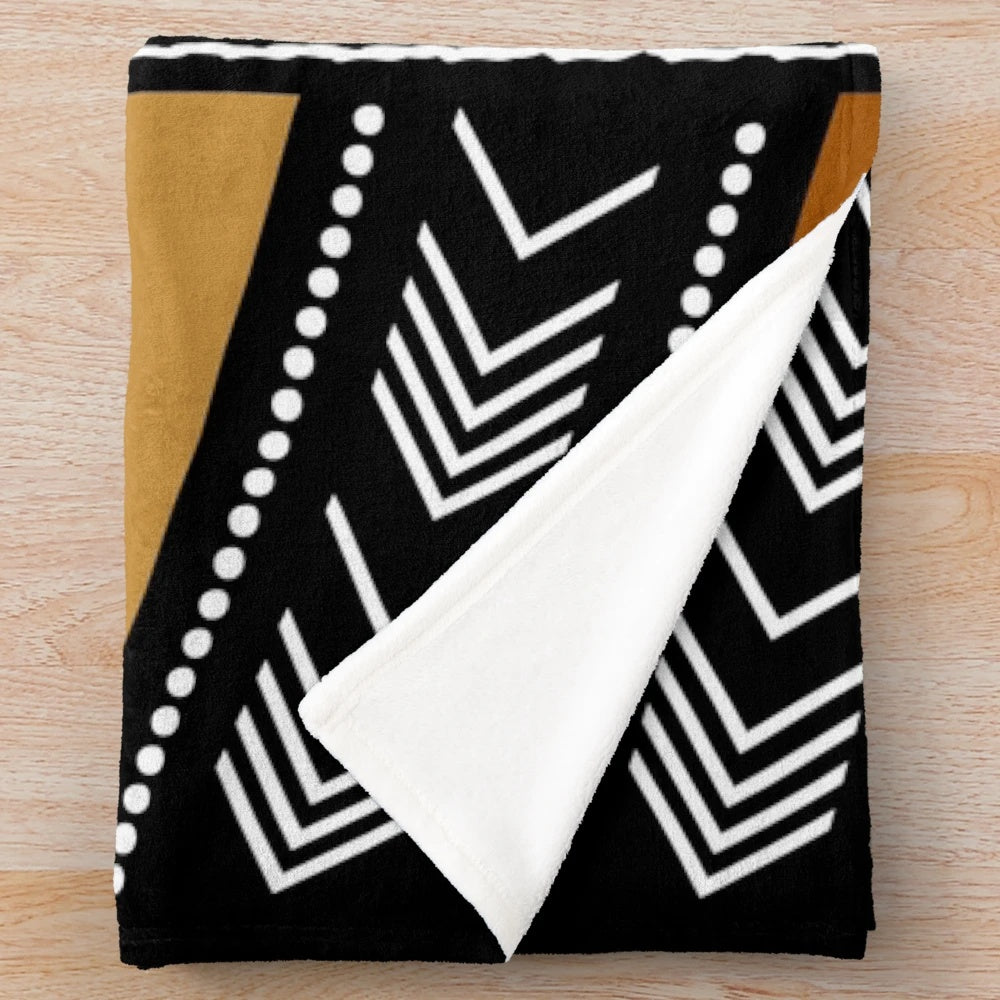 African mud cloth inspired plush blanket with abstract tribal patterns