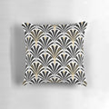 An art deco-inspired throw pillow with a classic fan pattern in black and white