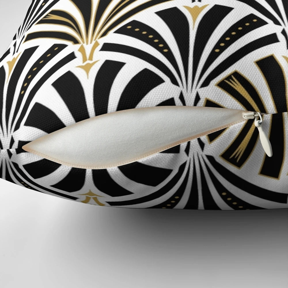 An art deco-inspired throw pillow with a classic fan pattern in black and white
