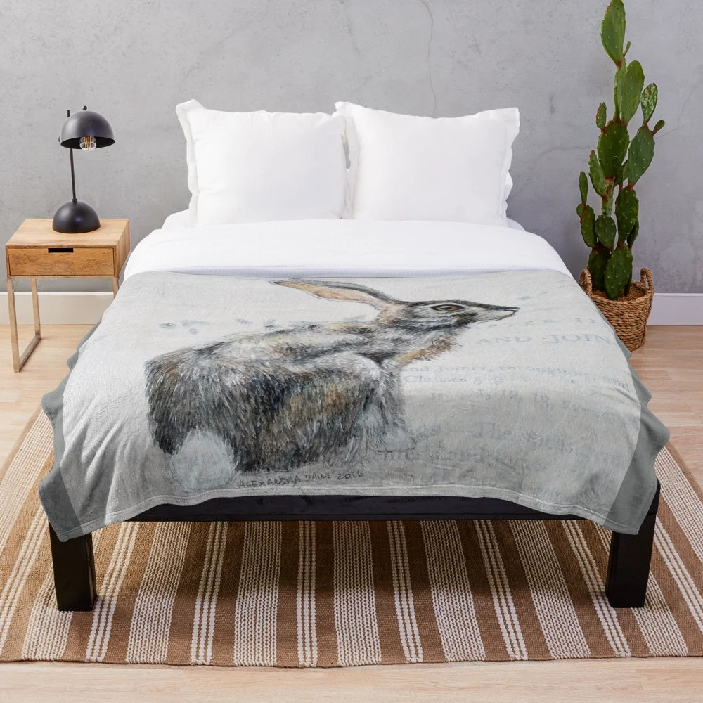 Soft, cozy plush blanket featuring a beautiful watercolor hare design