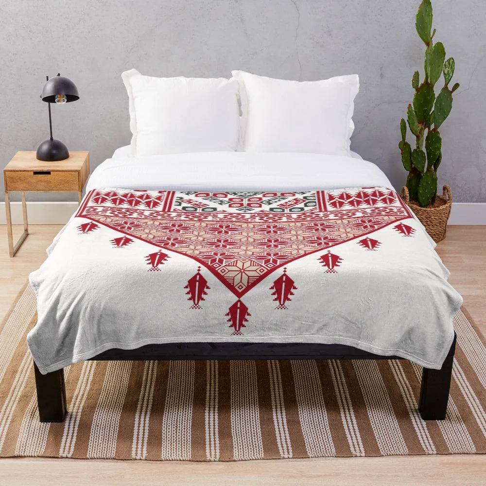 Vibrant Palestinian Tatreez Cross Stitch Art Design on Plush Blanket