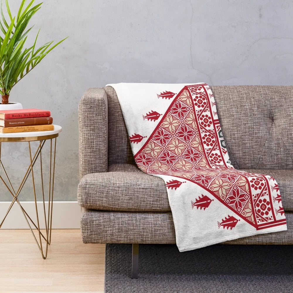 Vibrant Palestinian Tatreez Cross Stitch Art Design on Plush Blanket