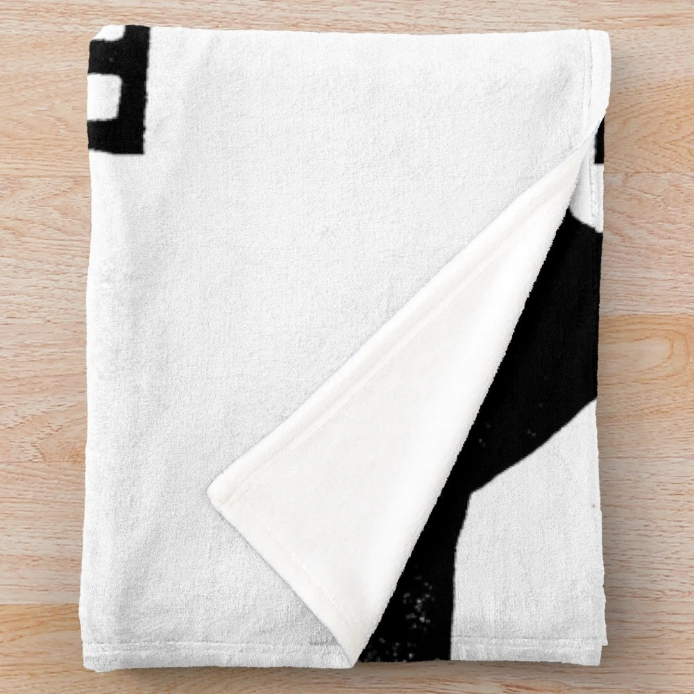 Plush blanket featuring a linocut design of the 'Fin' symbol from French cinema