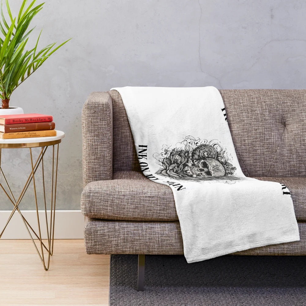 Plush blanket featuring a tattoo design, showcasing artistic expression